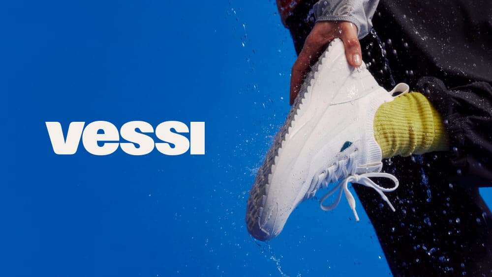 Vessi waterproof sneaker on signature blue, yellow sock detail